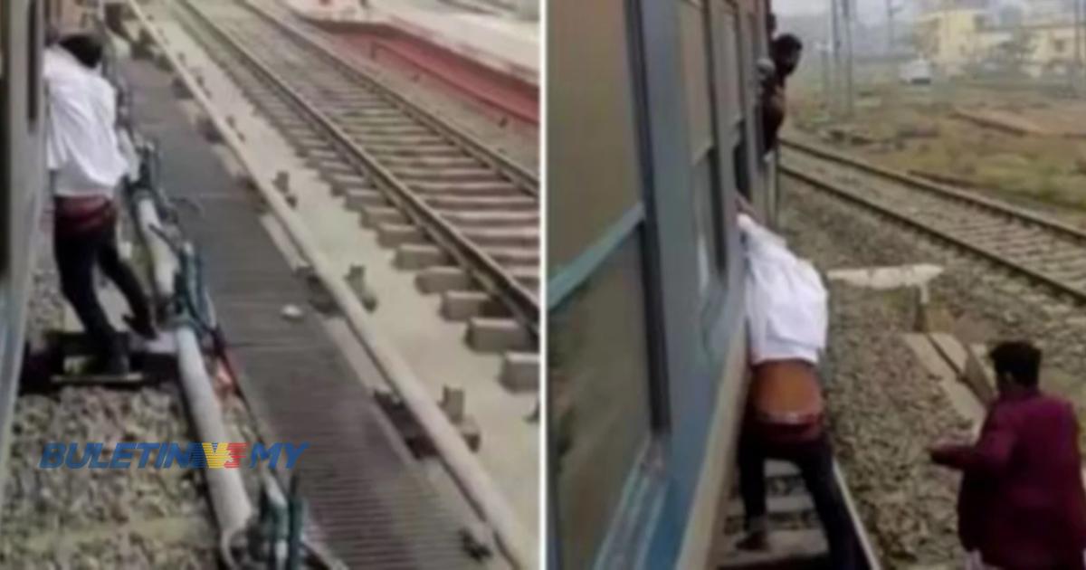 Pencuri telefon bimbit dibiar berpaut pada tingkap kereta api bergerak 