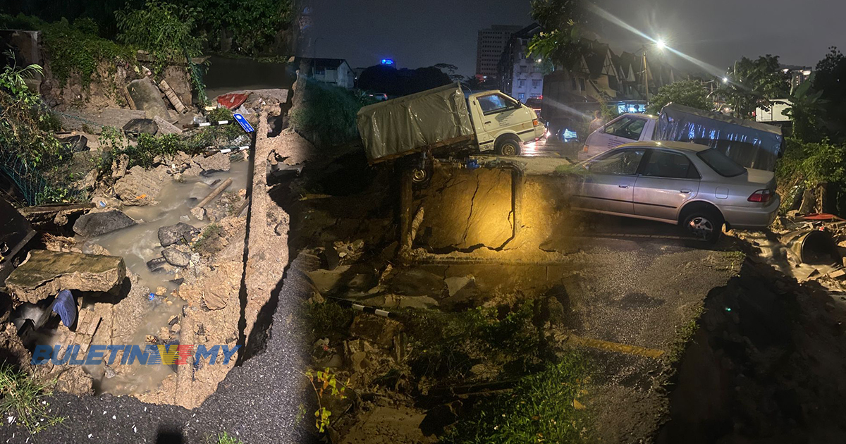 Dua kenderaan jatuh dalam longkang akibat tanah runtuh