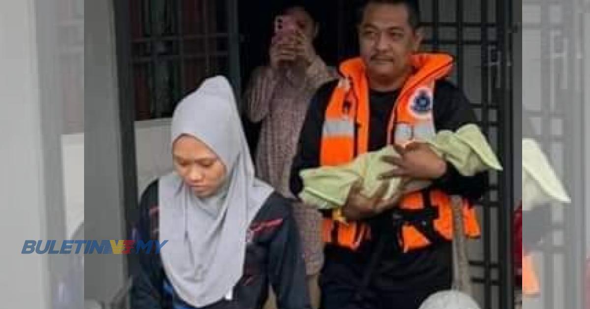 Polis Kluang selamatkan ibu berpantang, bayi berusia tiga minggu terperangkap banjir