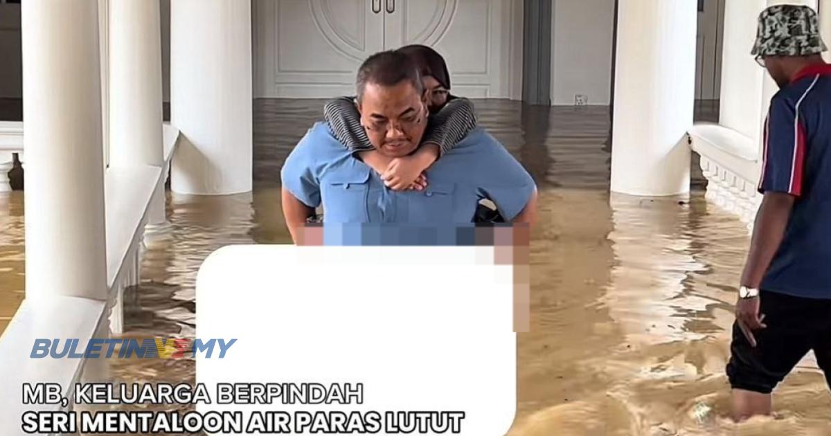 Banjir: Sanusi kendong anak, berpindah dari Seri Mentaloon