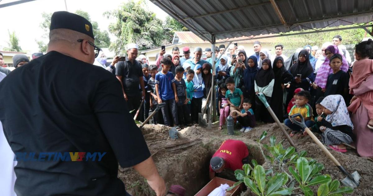 Hujan renyai iringi pengebumian Mohamad Fahmi Hafiz